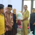 tingkatkan-kesejahteraan-masyarakat,-pj-bupati-takalar-serahkan-bantuan-di-kecamatan-mangarabombang